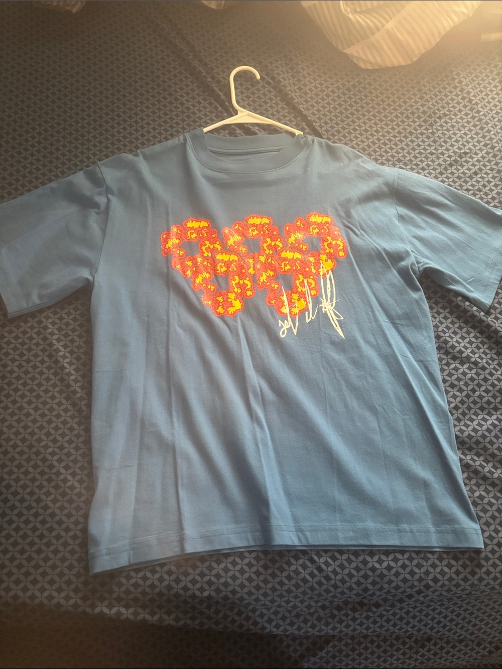 Blue Short-Sleeve Graphic Tee with Orange Floral Heart